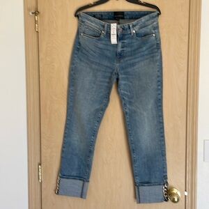 White House Black Market slim ankle mid-rise jeans.